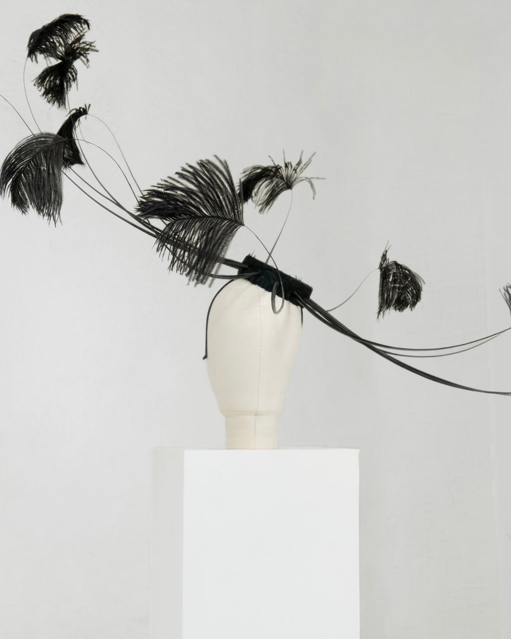 Savage by Boni feather couture hat in black detail shot